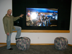 We built a Sony 70" into a tight corner years ago. 